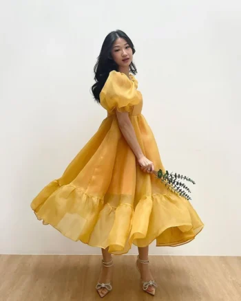 Yellow puffy dresses